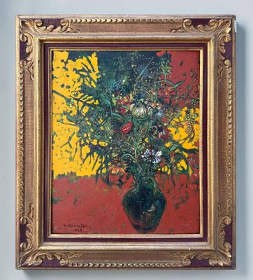 un tableau de fleurs dans un vase sur le mur