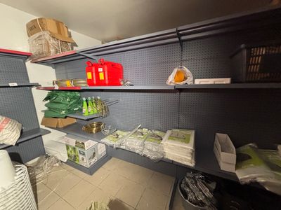 many items on the shelves in the room