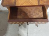 a small table with a chess board on it
