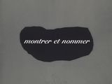 black and white photograph of a piece of paper with the words mother et nommer written on it