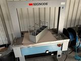 a picture of a machine that is sitting in a garage