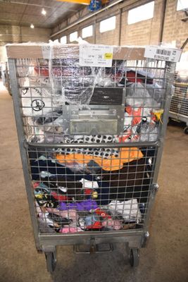 a shopping cart with many items in it in a warehouse