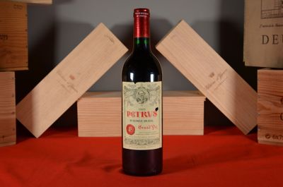 a bottle of wine that is sitting on a table