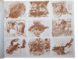 drawings of people and animals on a sheet of paper on a white surface