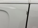 a close up of a car door handle with a sticker on it