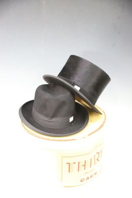 two hats sitting on top of each other on a table