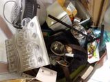 a pile of clutter and other items in a box