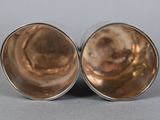 pair of antique silver plated salt and pepper shakers