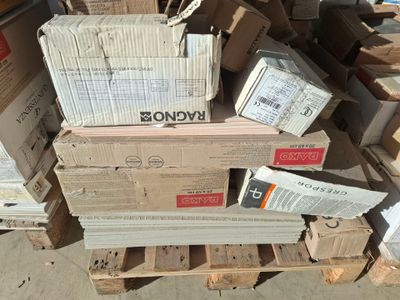 a pile of boxes sitting on top of a pallet