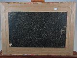 a picture of a chalk board on a wooden easel