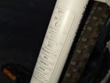 a close up of a bike with a sticker on it