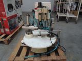 a machine that is sitting on a pallet in a warehouse