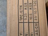 a box that has a label on it sitting on the floor
