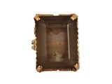 une bague en or ornée d'un quartz fumé au centre
