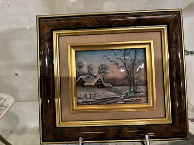 une image d'une peinture exposée dans une vitrine