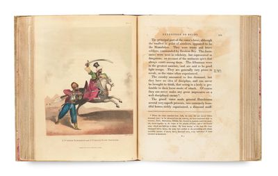 an open book with a drawing of a man on a horse