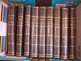 a box full of old books on a shelf