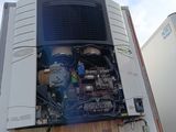 a large air conditioner sitting on the back of a truck