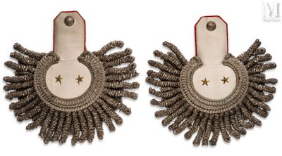 two pairs of earrings with a star on each side