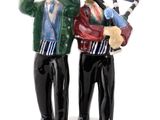two figurines of two men standing next to each other