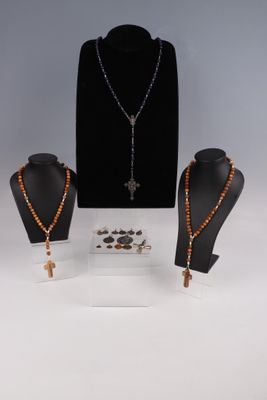 an assortment of jewelry including a necklace, bracelet, and ring
