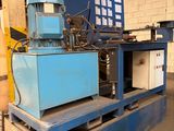 a blue machine that is sitting in a building