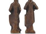 pair of bronze figurines of a man and a woman