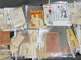 a suitcase filled with many different types of papers