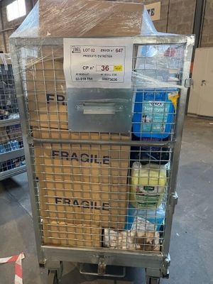 a cart with a lot of items in it in a warehouse