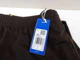 the back of a pair of black pants with a price tag on it