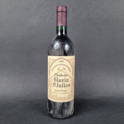 a close up of a bottle of wine on a table