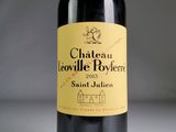 a bottle of wine that is sitting on a table