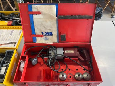 a red box that has a bunch of tools inside of it