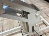 a machine that is sitting on the floor in the kitchen