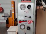 a machine that is sitting inside of a building