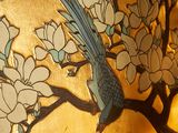 a painting of a bird sitting on a branch of a tree
