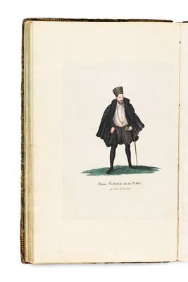 un livre ouvert sur lequel figure le dessin d'un homme vêtu d'une cape