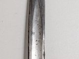 a knife that is sitting on top of a table
