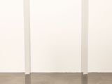 an image of a white table in a room
