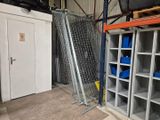a room that has a bunch of shelves in it