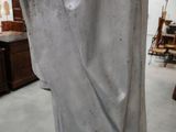 a statue of a woman that is in the process of being made