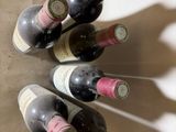 several bottles of wine are arranged in a circle on a table