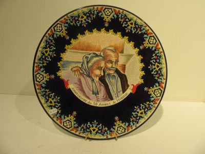 a plate with a picture of a man and a woman on it