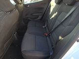 the back seat of a car with a seat belt in it
