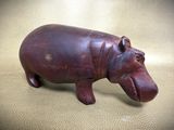 a figurine of a hippo in the shape of a hippo