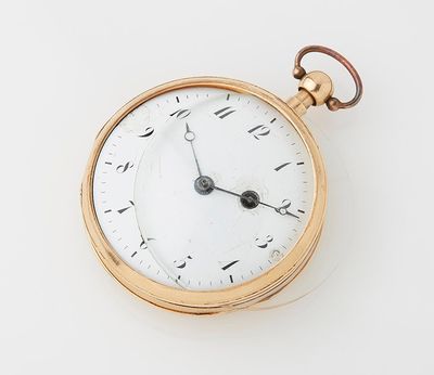 an antique pocket watch with a gold case and roman numerals on the face