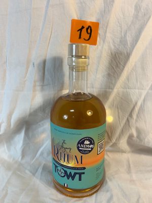 a bottle of alcohol that is sitting on a table