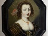 portrait of a lady in a green dress with a gold chain around her neck