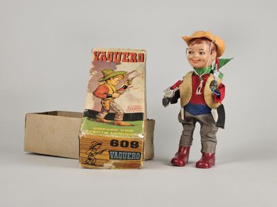 a toy that is standing next to a box