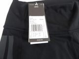 the back of a pair of black pants with a price tag on it